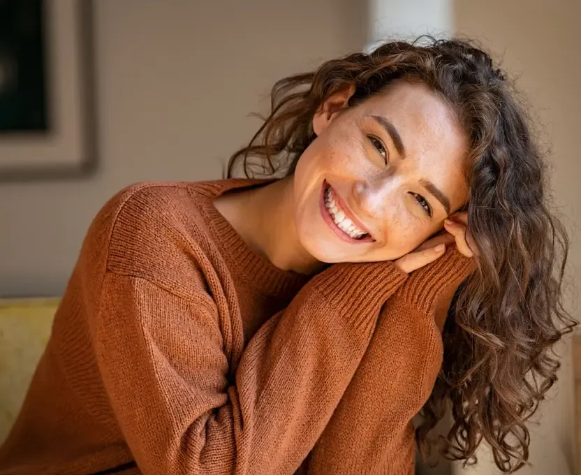 Woman with a beautiful smile after cosmetic dentistry in Cedar Park
