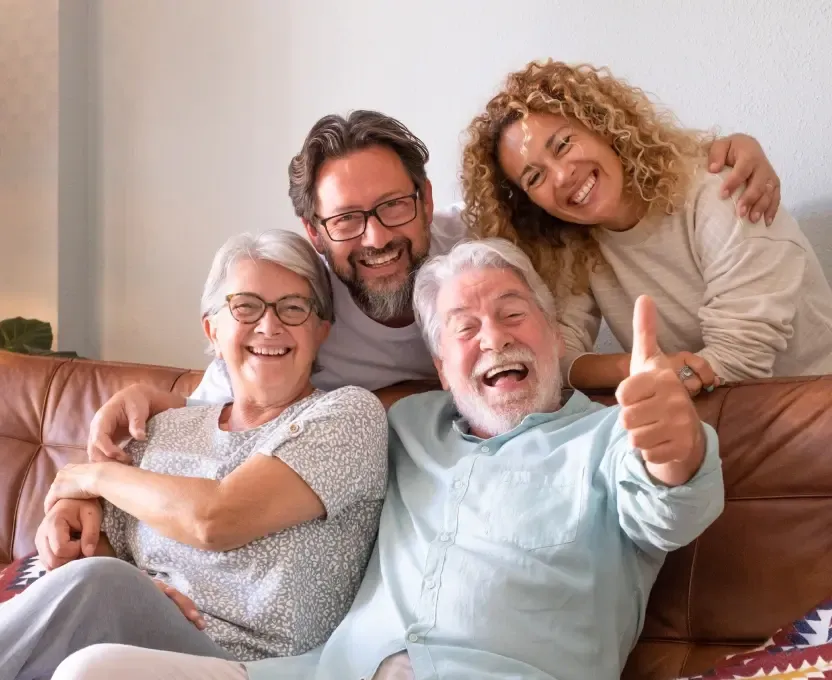 Three generations of a family smiling — family dentist in Cedar Park